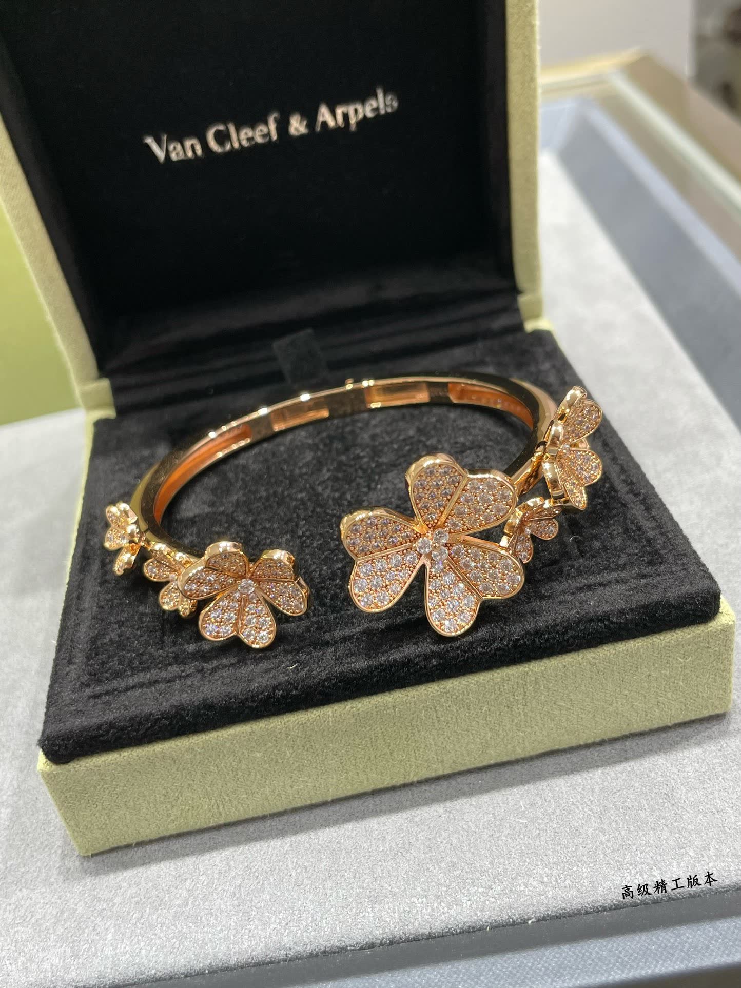 Van Cleef & Arpels Silver Flower Bracelet with Diamonds